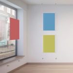 Ceiling to Wall Clear Cord Displays, Hanging System
