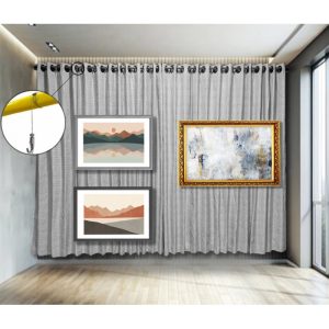picture hanging in front of curtains or drapes