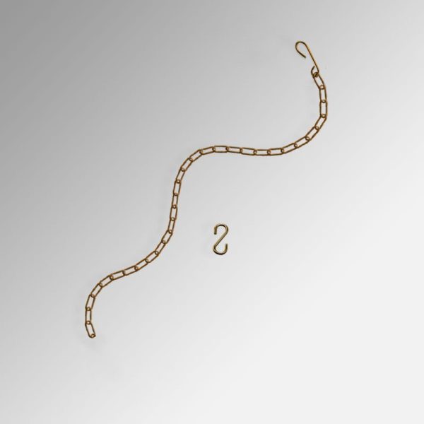 picture hanging in front of curtains or drapes with steel chain