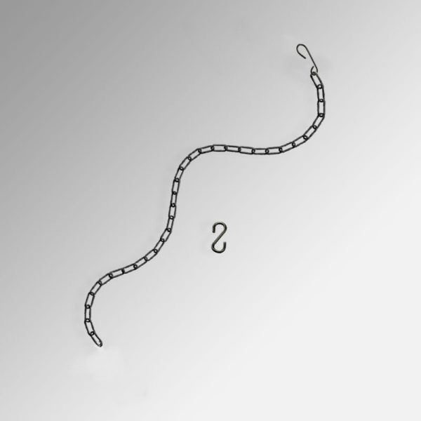 picture hanging in front of curtains or drapes with steel chain
