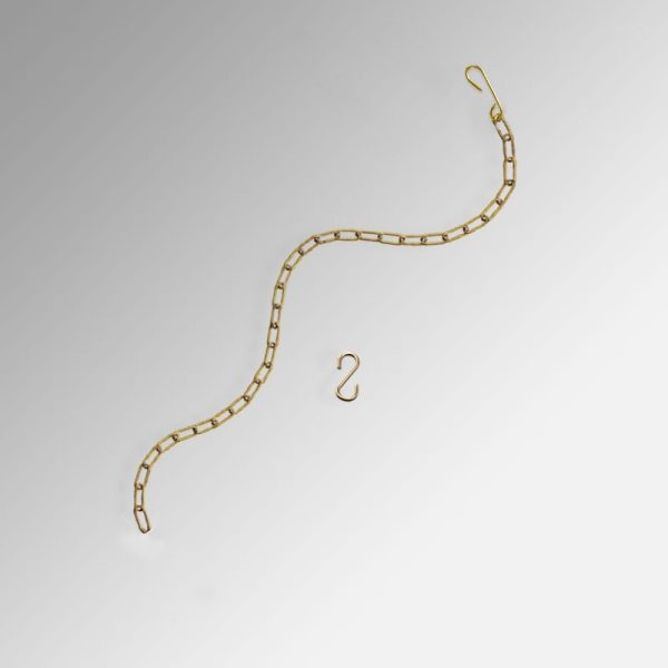 picture hanging in front of curtains or drapes with steel chain